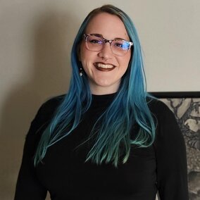 Danielle Galvin posing for professional headshot